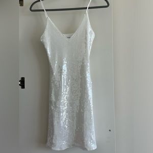 White sequin mini dress by Beginning